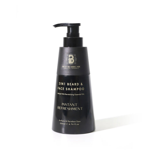 2In1 Beard And Face Shampoo: A black bottle with a black lid and gold text. A nourishing solution for deep cleansing and revitalization of your beard and facial skin.