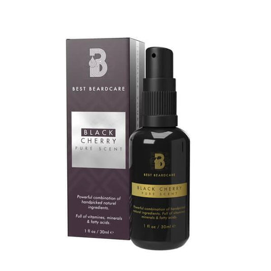 A bottle of Black Cherry Beard Oil, a nourishing blend of oils enriched with black cumin, almond, goji berry, and chia seed oil. Perfect for a glamorous and chic grooming routine.