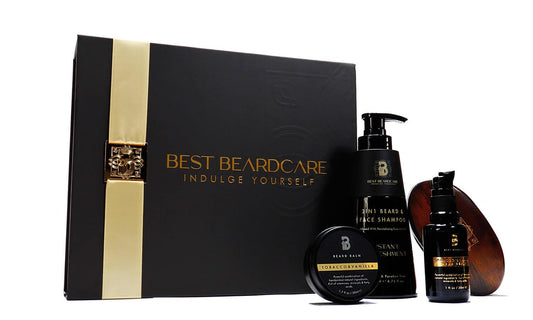 Tobacco & Vanilla Gift Set Beard Grooming Kit with Beard Wax - A black box with a black container and a bottle of hair gel. Includes beard shampoo, oil, wax, and a boar bristle brush.