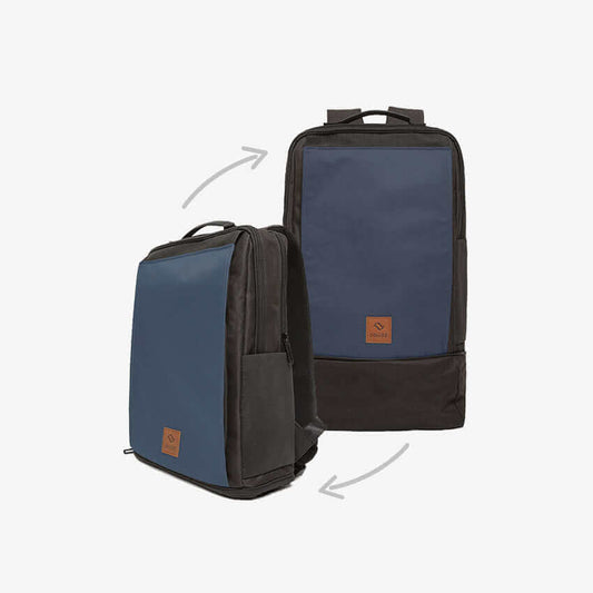 A navy blue 2-in-1 Urban Commuter Backpack with expandable bottom, jacket holder, shoulder strap pockets, and organized compartments for laptop and belongings. Machine washable.