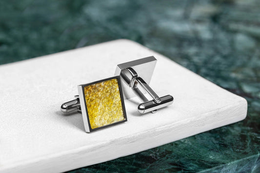 Cufflinks made of yellow trout leather, featuring a square shape. Handmade with unique fish scale patterns. Size: 1.7 cm. Stainless steel material. Packed in a gift box.