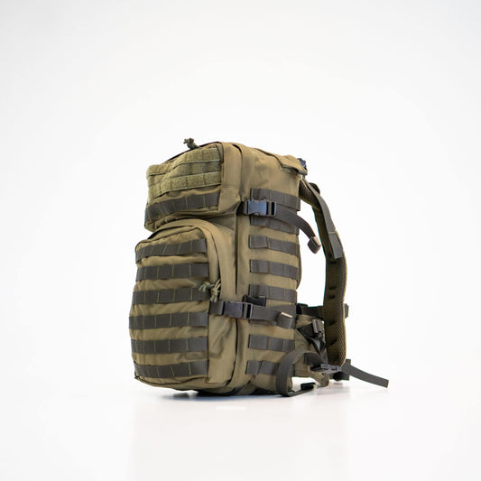 Durable military green backpack with multiple straps and spacious pockets. 35L capacity, Cordura material.