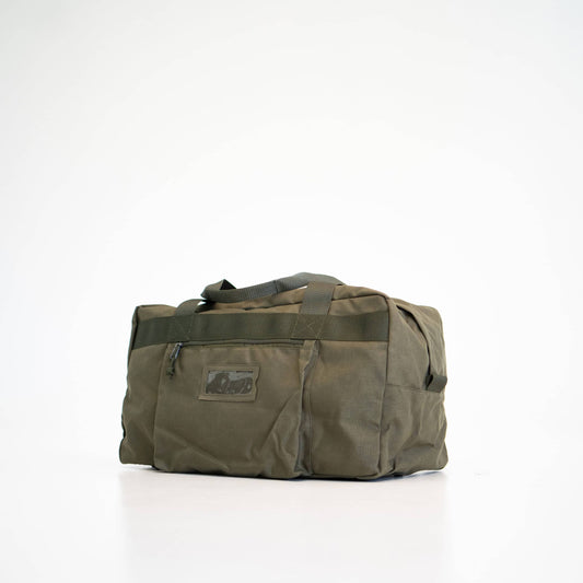 Travel Bag - Military Green, made from durable Cordura with zippered pockets, handles, and a large opening. Perfect for travel or as a gym bag. 31 cm x 55 cm x 25 cm.