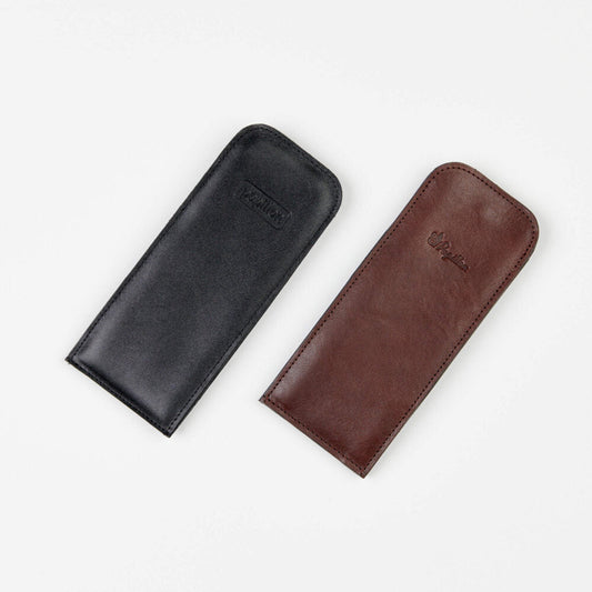 Leather Glasses Case, a sleek and durable accessory for your eyewear. Snug fit, snap button closure, and compact size for easy portability.