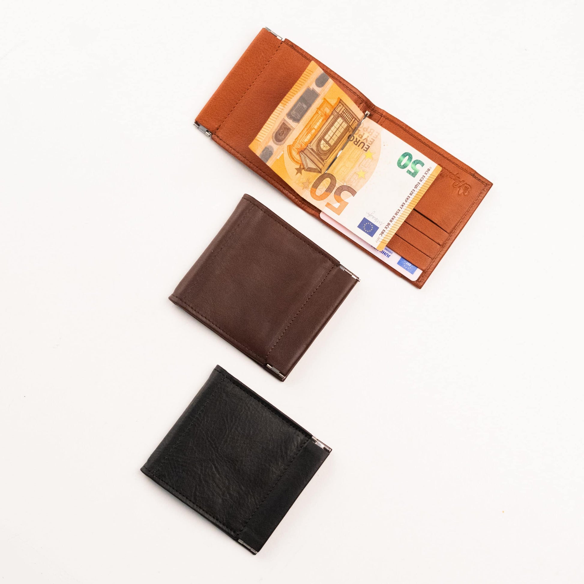 A Leather Wallet with money clip and coin pouch, made from genuine leather in Europe. Features 9 card slots, 1 ID window, and a metal clip for paper currency. Compact and stylish.