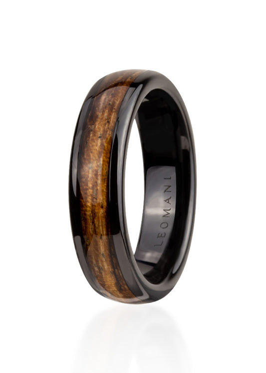 Men's ring Kahoy, a black ceramic and veneer masterpiece. Lightweight, durable, and elegant, this 7mm wide ring is perfect for everyday wear or as a unique gift.