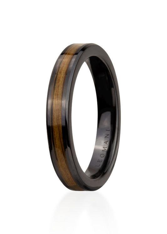 A black ceramic men's ring with a wood inlay, weighing 3.11 grams and measuring 4mm in width. From Men In Style.