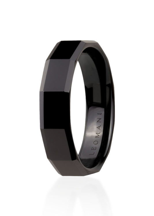 Men’s ring Singa, a black ceramic band with a faceted design, embodies contemporary elegance for the discerning gentleman. Lightweight and durable, this 6mm wide accessory complements any style.