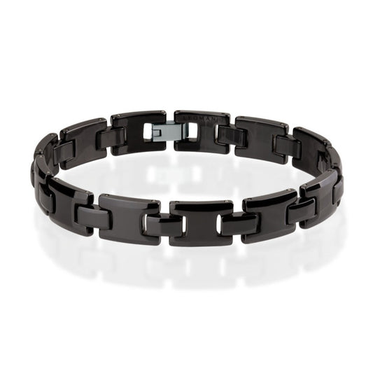 Trey Bracelet for Him, a black ceramic fashion accessory with a stainless steel clasp. Adjustable length for a comfortable fit. Elevate your everyday look with this versatile and sophisticated addition to his wardrobe.