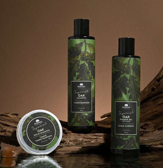 A group of shampoo bottles and a jar of hair gel from the Daily Essentials Hair Care Set for Men, featuring Oak Shampoo, Solid Shampoo, and Oak Shower Gel. Natural ingredients provide gentle care with soothing, anti-inflammatory, and moisturizing properties. Paraben-free, silicone-free, vegan, alcohol-free, EU allergen-free, cruelty-free, and minimal ingredients. From Men In Style, an exclusive range of men's accessories.