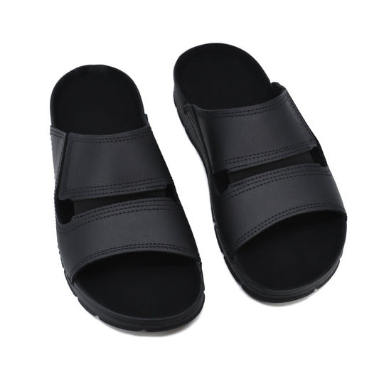 Slip-On Leather Sandals - Black, a pair of comfortable and stylish footwear for men. Crafted from natural leather with a supportive outsole, these sandals are perfect for various settings. Designed and manufactured in Europe.