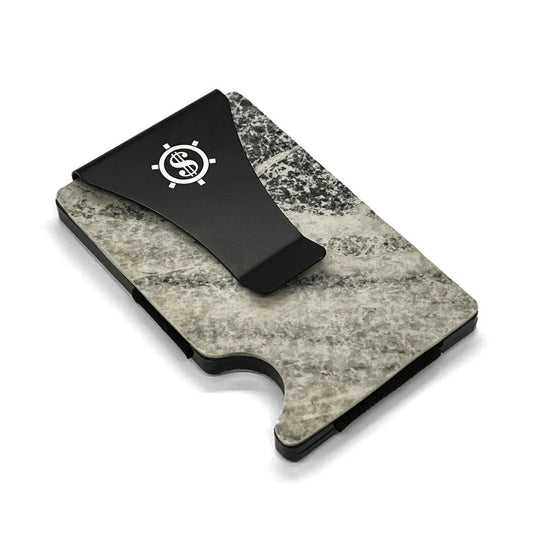 Marble card holder with RFID blocking, featuring a sleek money clip. Holds up to 12 cards securely. Eco-friendly packaging.