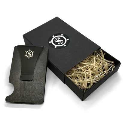 A black box with a slate card holder and a dollar symbol clip. RFID blocking technology and eco-friendly packaging.