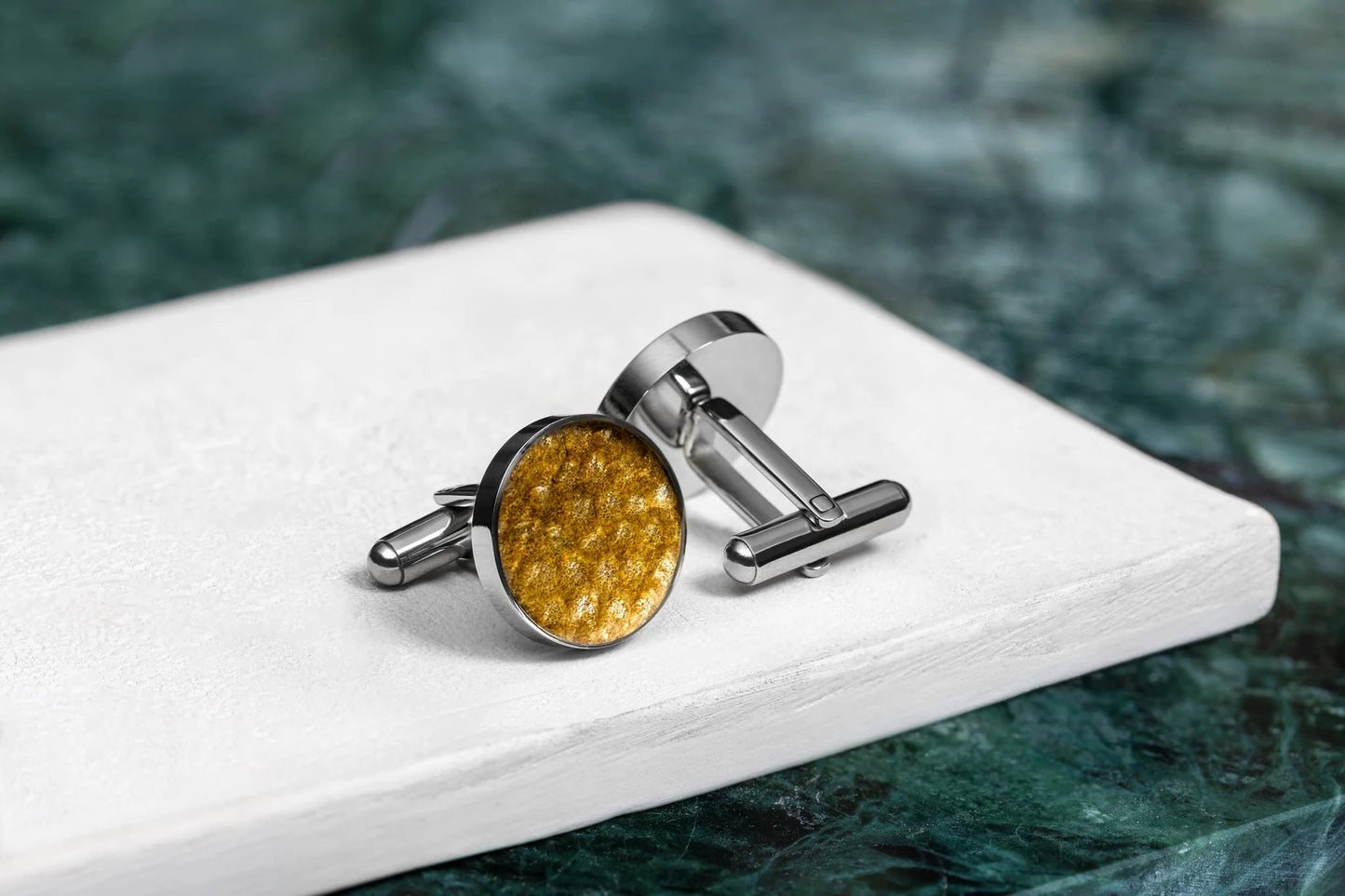 Cufflinks – Round – Yellow Trout Leather, featuring unique fish leather patterns on a white surface, crafted with stainless steel.