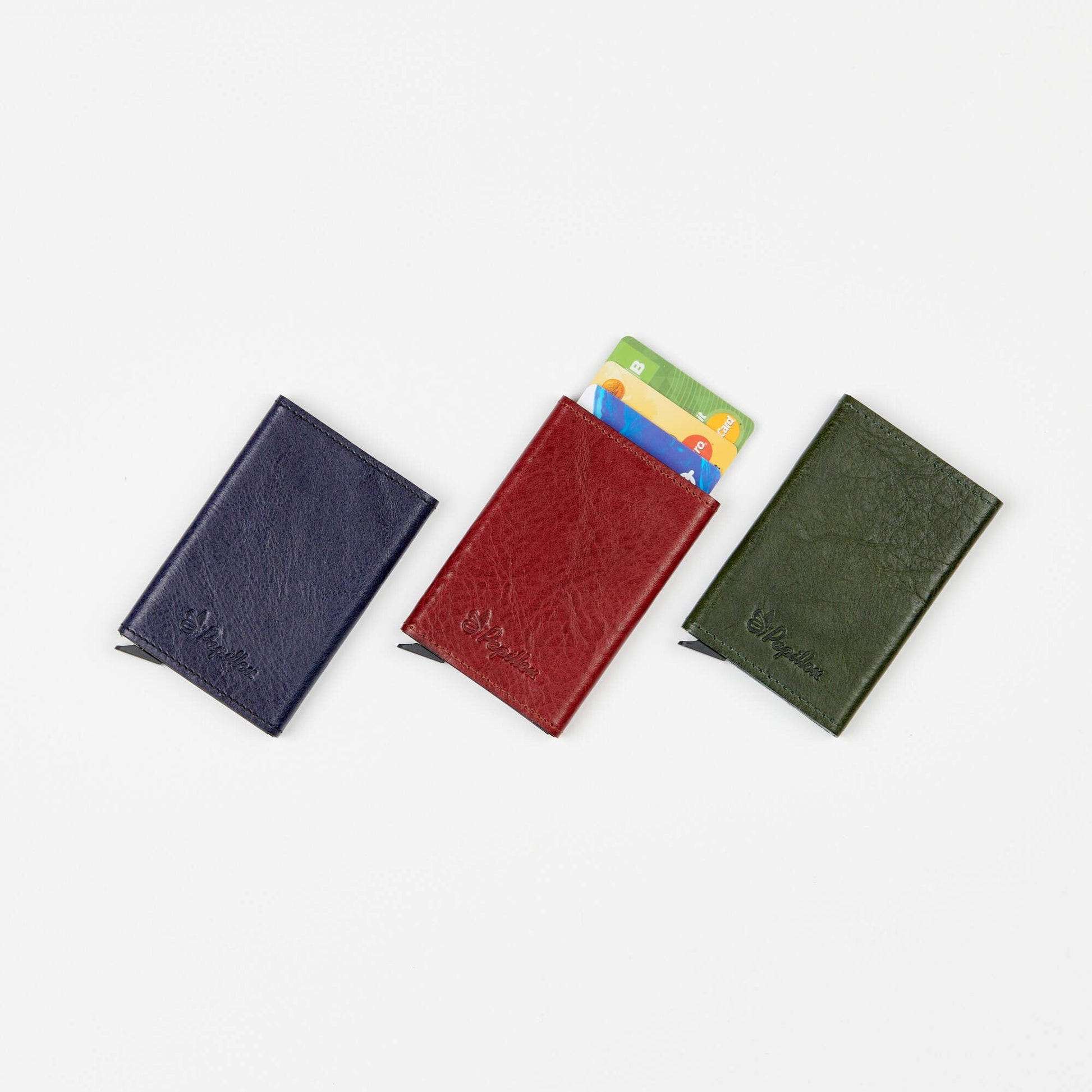 Card Holder (6 Cards) - Leather and Aluminum. Genuine leather and sturdy aluminum protect your cards from unauthorized scanning. Holds up to 6 cards with easy access. Crafted with meticulous European craftsmanship. Dimensions: 10 x 6.5 x 1cm. From Men In Style.