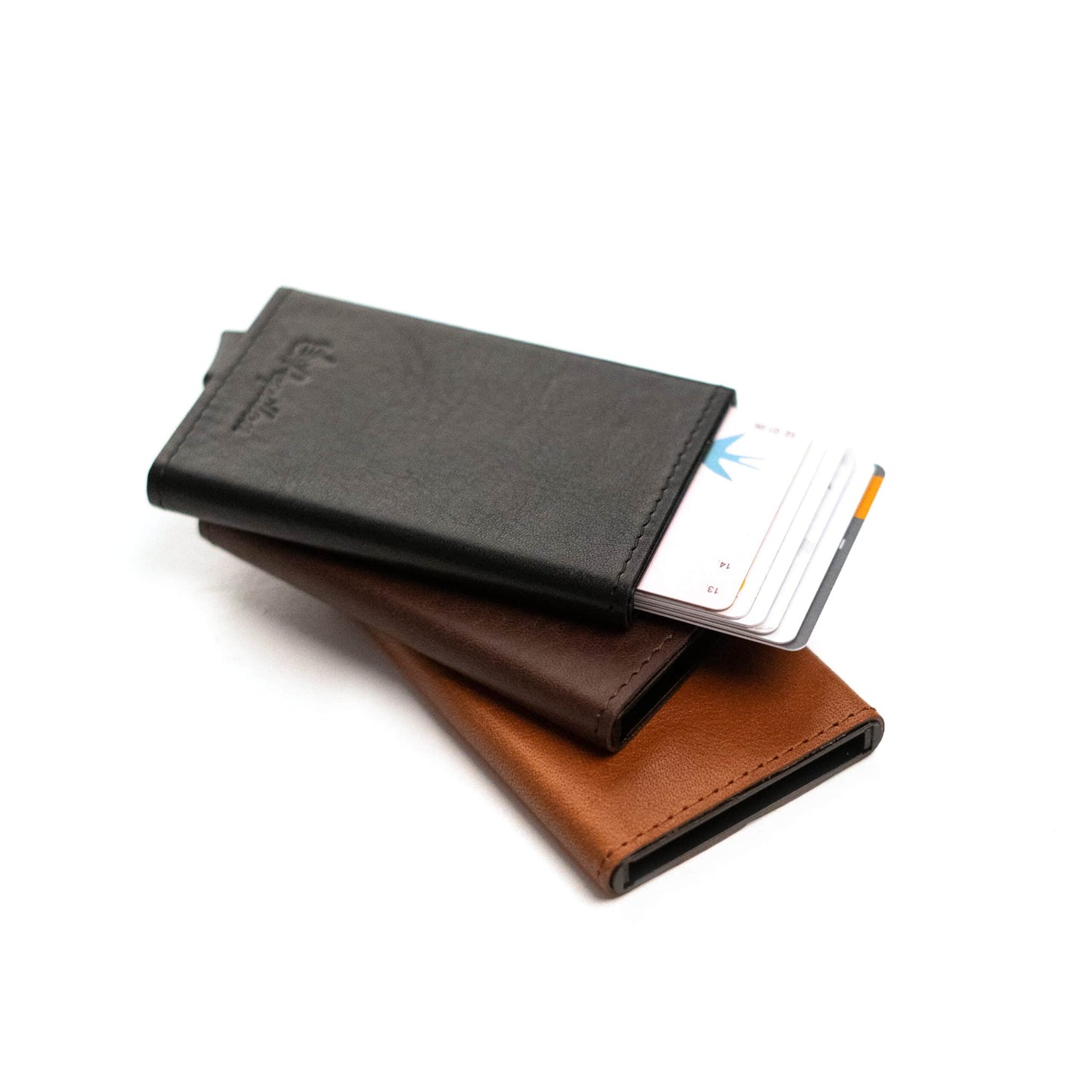 Card Holder (6 Cards): Genuine leather and aluminum case with RFID/NFC blocking. Sleek design, easy access, and durable craftsmanship from Men In Style.