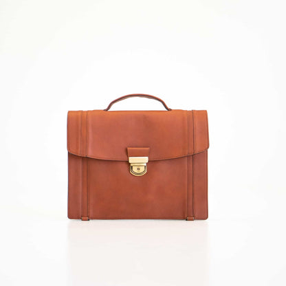 Genuine Leather Briefcase - Brown leather bag with gold clasp, cable close-up. Stylish and functional accessory for professionals on the go.