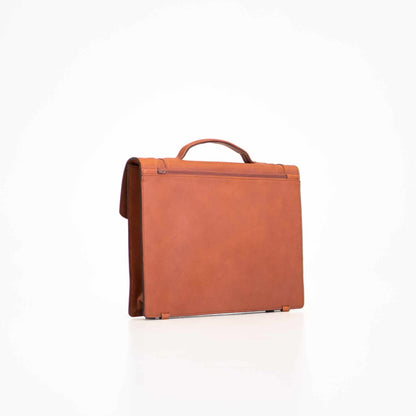 Genuine Leather Briefcase - 1 Compartment - Cognac. Elevate your professional look with this stylish and functional accessory. Crafted from the finest quality leather, it offers ample storage, easy access pockets, and a carabiner for securing keys. Lightweight and durable, it's perfect for everyday use. Designed and produced in Estonia, it ensures quality craftsmanship. A must-have for a polished and organized lifestyle.