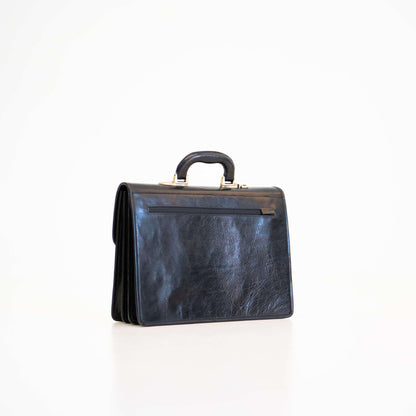 Genuine Leather Briefcase with 3 compartments, perfect for professionals. Sleek black design, spacious and organized. Reliable and refined.