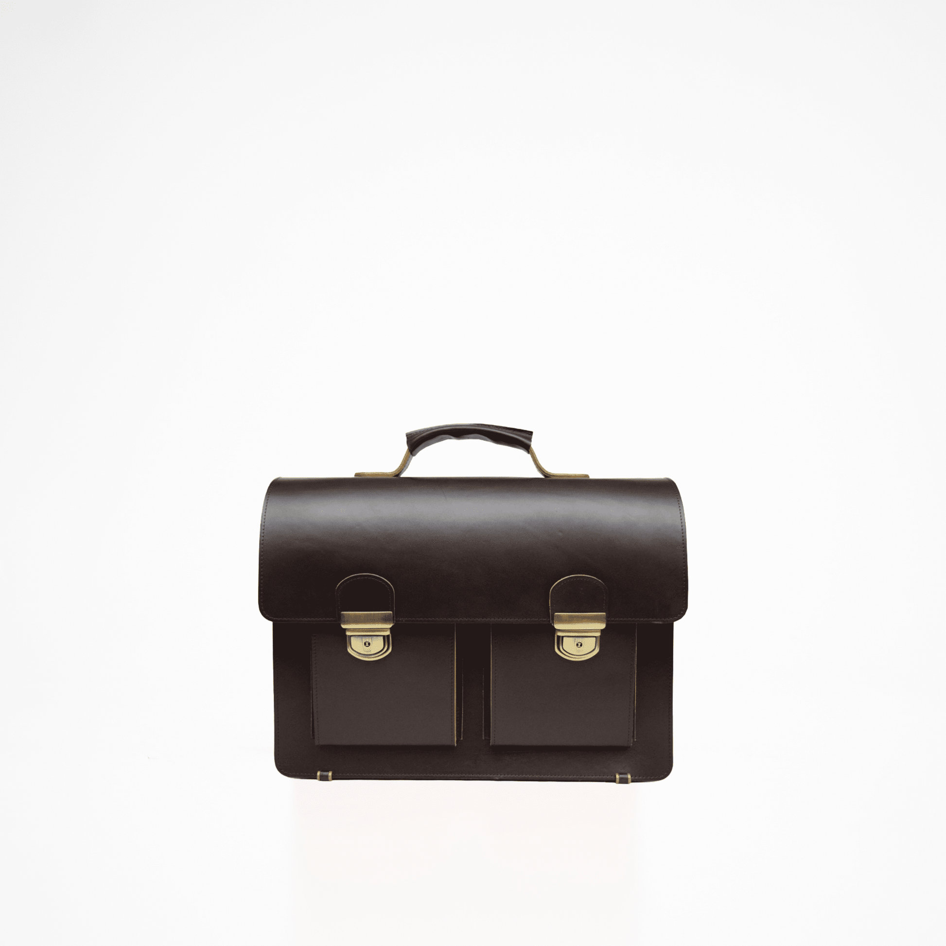 A Genuine Thick Leather Briefcase - Dark Brown, featuring two compartments and pockets for laptop, notebook, and iPad. Includes carabiner, pen holders, and adjustable shoulder strap. Crafted with durable, vegetable-tanned leather for timeless elegance. Perfect for elevating your style and functionality.