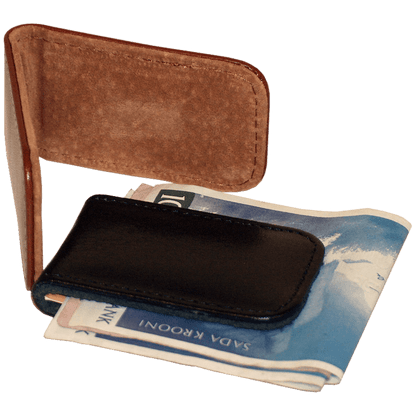 A sleek leather magnetic money clip with cash in it, perfect for streamlined everyday carry. Compact size for convenient pocket or bag storage. Expertly crafted in Europe.