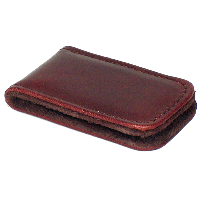 A close-up of the Magnetic Money Clip, a sleek leather accessory designed to securely hold your cash without the bulk of a traditional wallet. Compact and expertly crafted in Europe, it's perfect for effortless style and convenience.