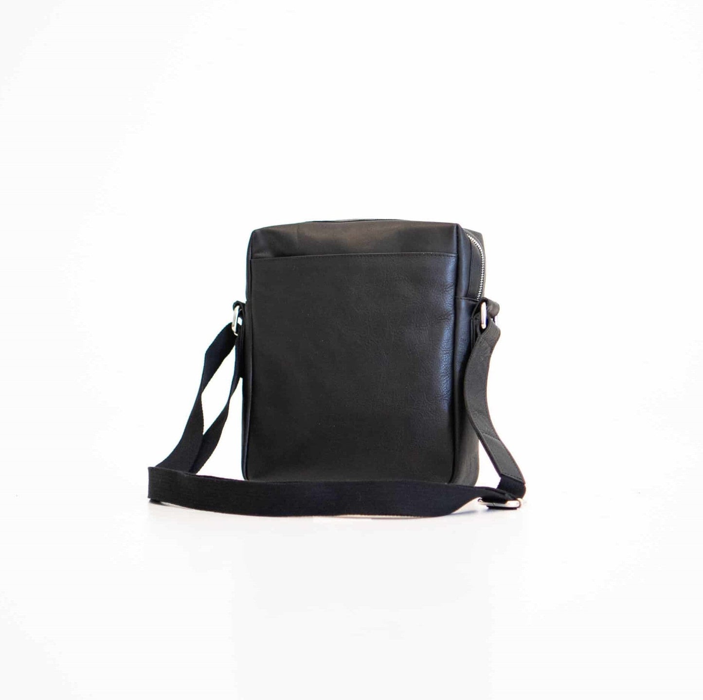 Small Shoulder Bag - Black: A versatile accessory made from genuine leather. Features a larger zippered compartment, smaller exterior pocket, and two interior pockets for organization. Adjustable full-grain leather shoulder strap. Embrace elegance and functionality with this enduring piece from Men In Style.