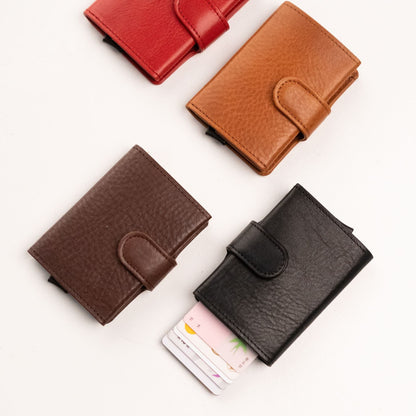 Leather wallet with RFID/NFC blocking card holder, showcasing multiple wallets with cards and a brown leather wallet on a white surface.