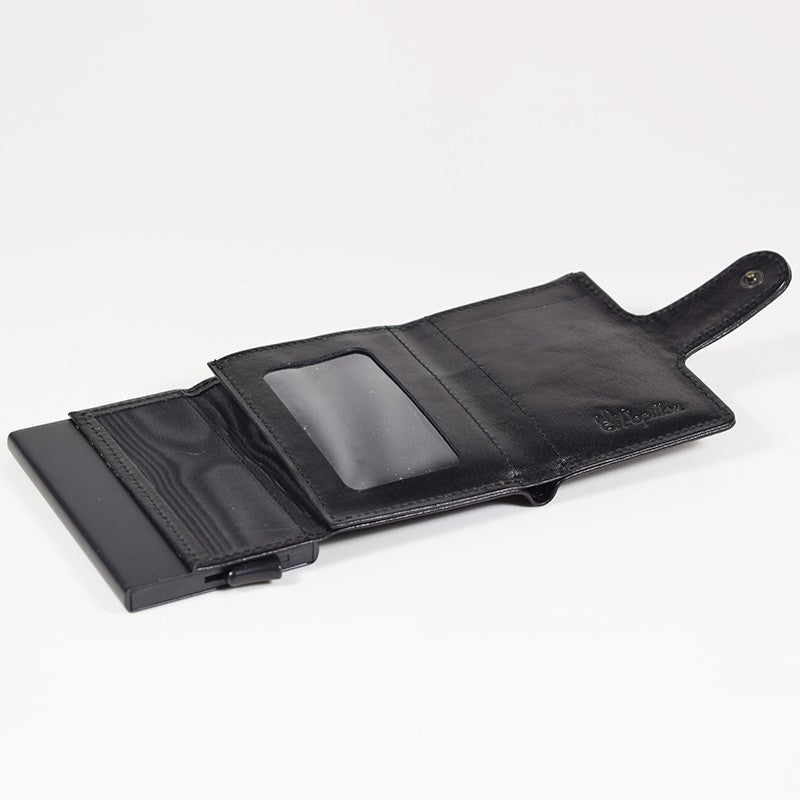 A black leather wallet with RFID/NFC blocking card holder, handmade in Estonia. Features 7 card slots and a cash compartment.