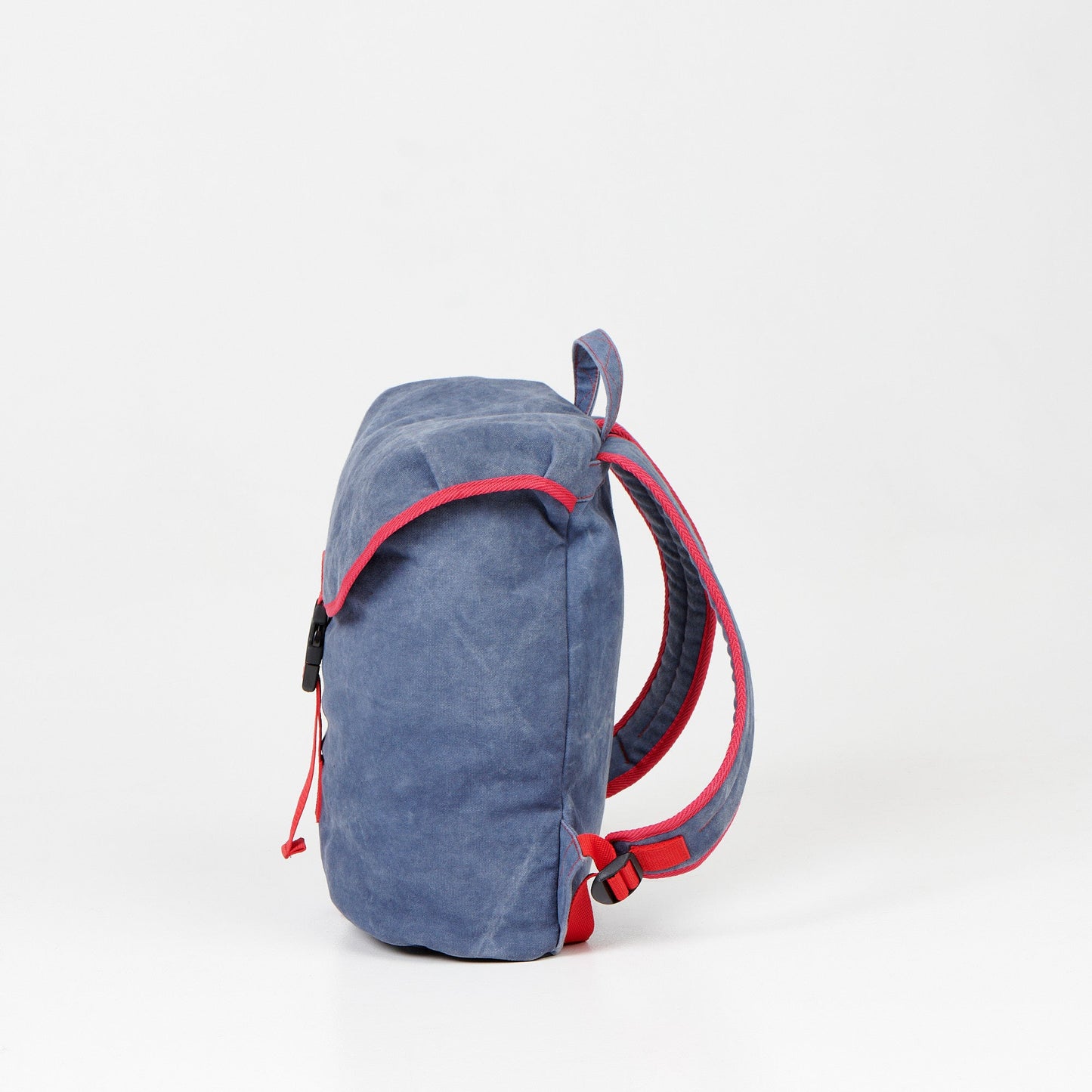 A durable 12L canvas backpack with a spacious interior, dedicated laptop pocket, and organized storage. Padded shoulder straps, bottom, and back for comfort. Handcrafted in Europe for premium quality.