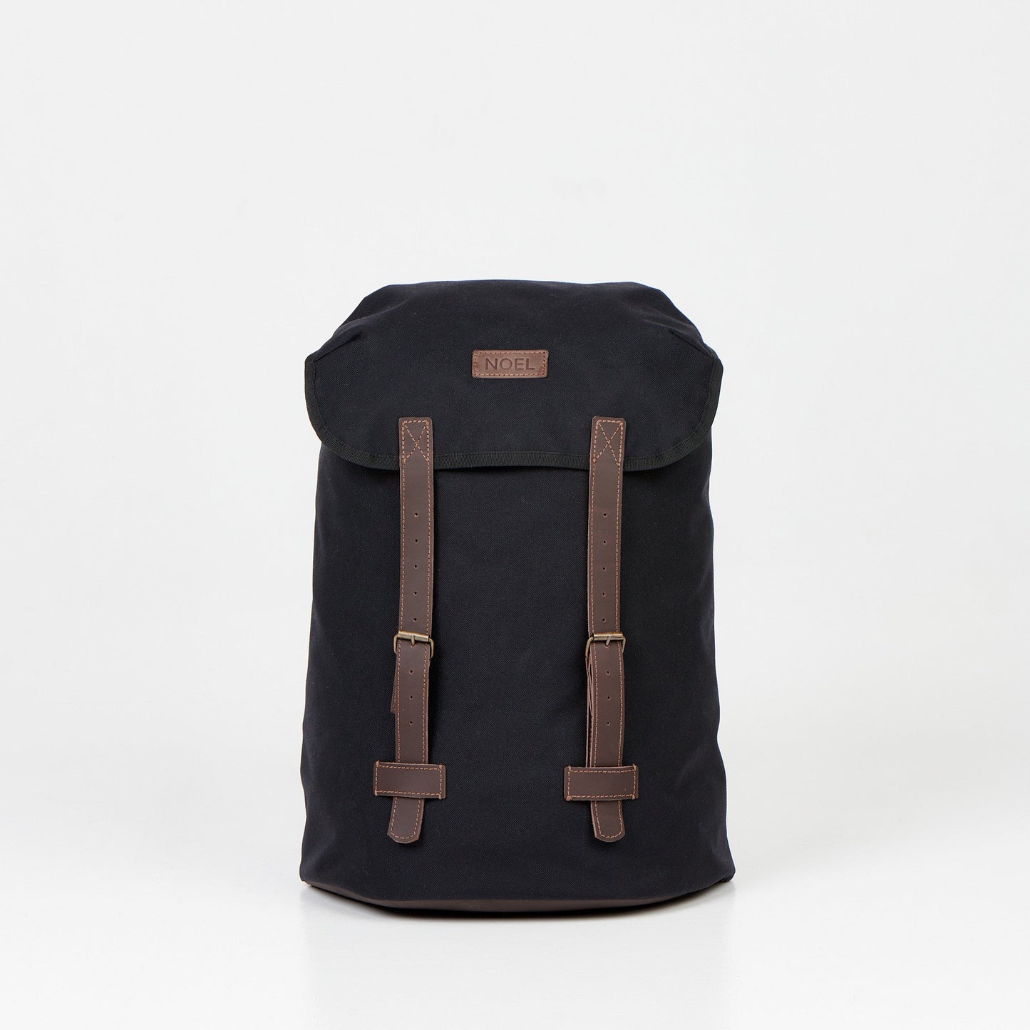 A durable 18L Waterproof Backpack in black with brown straps. Made of Cordura material, it offers waterproof construction and 4 smaller pockets for easy organization. Perfect for daily adventures.