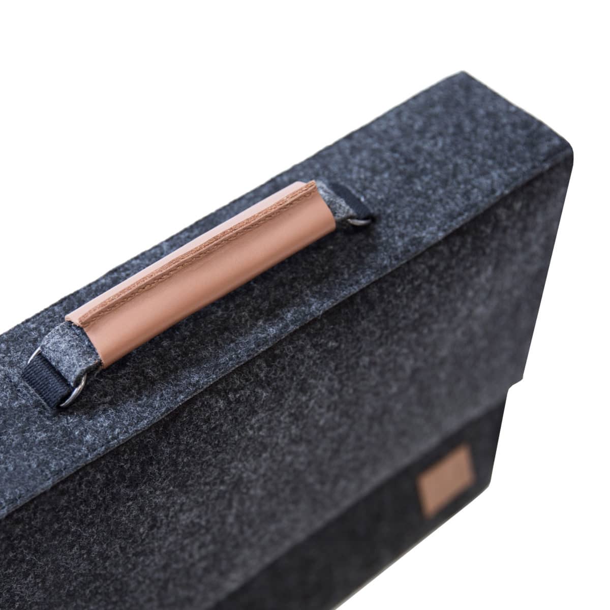 Briefcase with separate sleeve for up to 15" laptop - Black. Sleek and minimalistic style. Durable, eco-friendly material. Weatherproof protection. Handmade in Europe. Functional and portable.