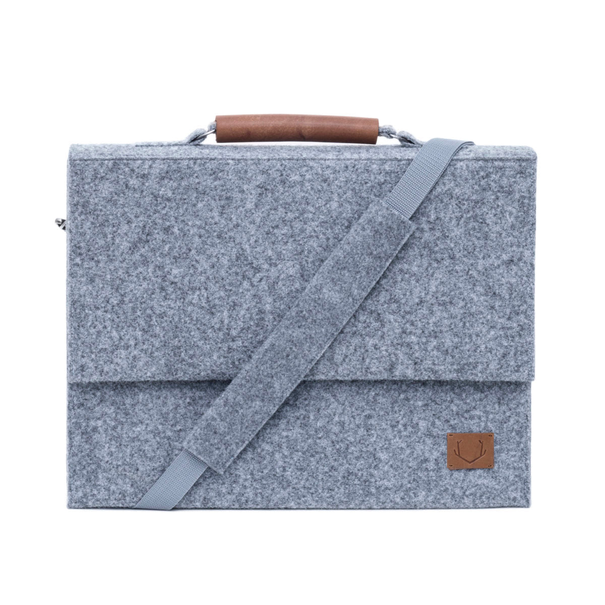 Briefcase with laptop sleeve, grey bag with brown strap, sleek and minimalistic style, perfect for work, laptop protection, ample space for documents, recycled PET felt, weatherproof, handmade in Europe, eco-friendly packaging, 30x38x8 cm, 586g, magnetic snaps, adjustable shoulder strap.