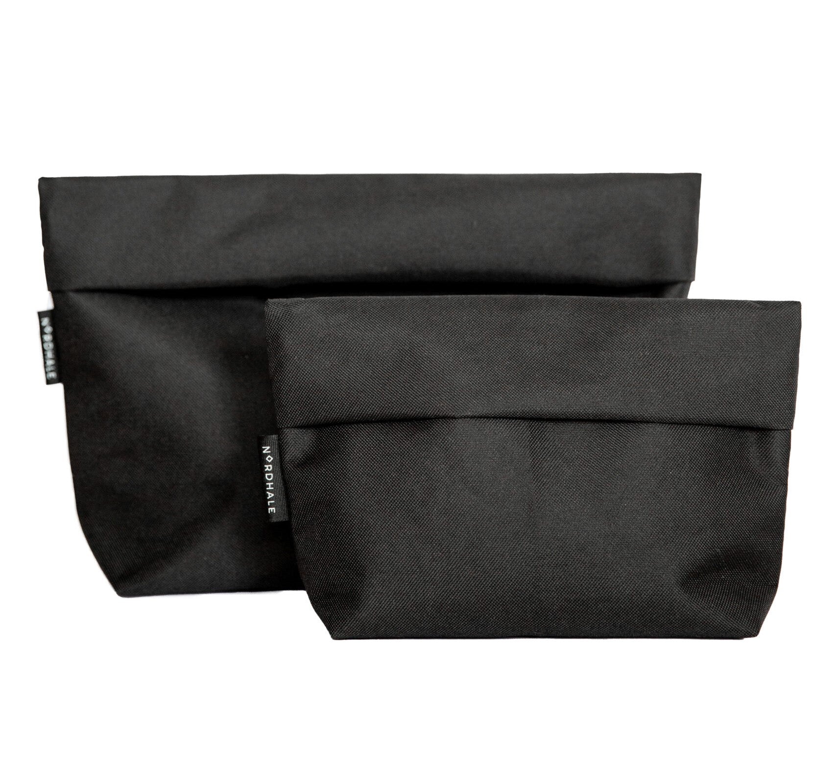 Toiletry bag with practical design, water-resistant material, and YKK® zippers. Available in two sizes: Small (1.6L) and Medium (4.2L). Handmade from high-quality polyester canvas. Perfect for travel enthusiasts.