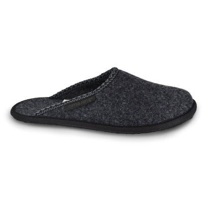 A close-up of black Natural Felt Slippers with a strap. Crafted in Europe, these sustainable slippers offer warmth and comfort for your toes.