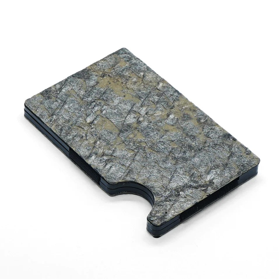 Slate Card Holder with RFID Blocking - Dark Desert, a minimalist metal cardholder made of natural slate stone, securely holds up to 12 cards. RFID blocking technology protects against contactless theft. Eco-friendly packaging reflects our commitment to sustainability.