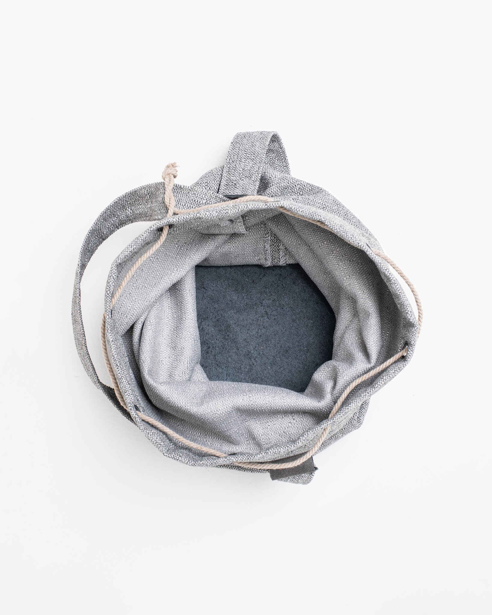 Upcycled bag - Light Grey: A handmade fabric bag with a handle and faux leather strap details. Eco-friendly and durable.