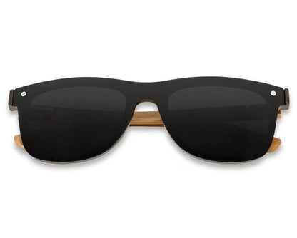 A pair of Eyewood Tomorrow - Taurus wooden sunglasses with black lenses, handmade for a natural feeling of comfort and design. UV400 polarized lenses, stainless steel hinges. L: 150 mm, W: 149 mm, H: 48 mm. Weight: 23 g.